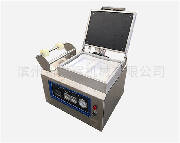 微型貼體包(bāo)裝機